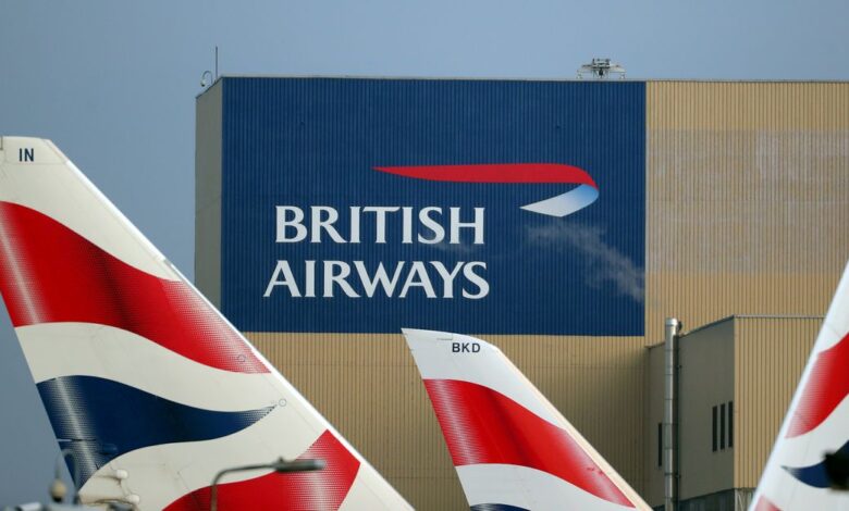 British Airways logos are seen on tail fins at Heathrow Airport in west London