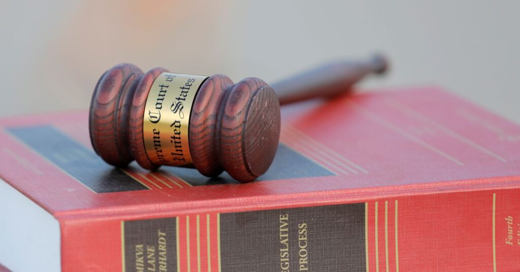 A gavel is seen on legal books in Washington, D.C.