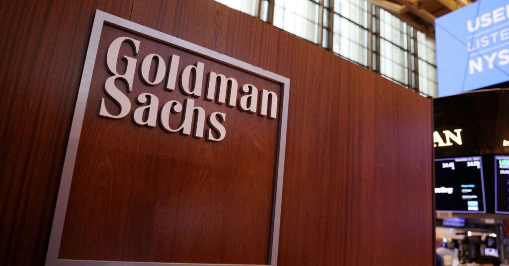 FILE PHOTO: The logo for Goldman Sachs is seen on the trading floor at the New York Stock Exchange (NYSE) in New York City