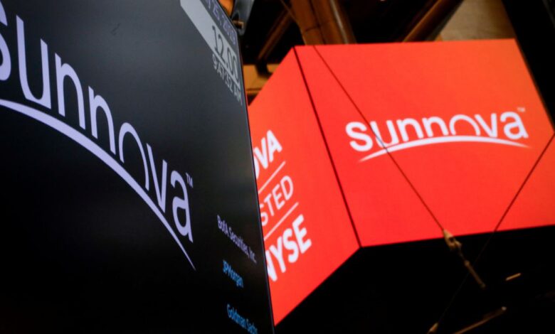 The logo of Sunnova Energy International Inc. is displayed on screens during the company's IPO on the floor of the New York Stock Exchange (NYSE) in New York