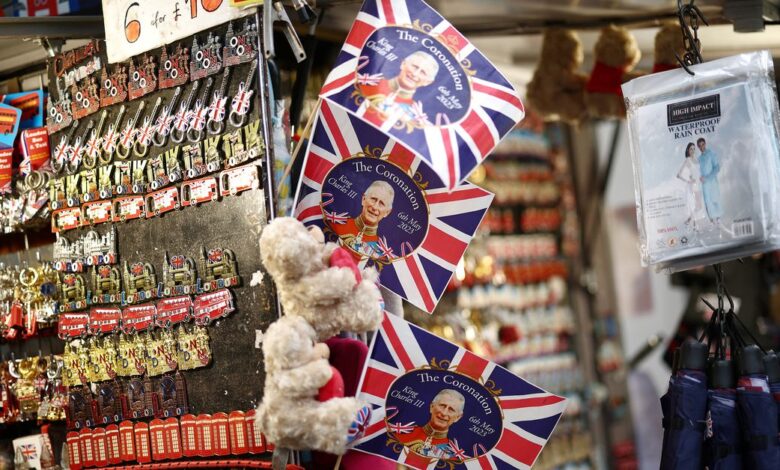 Souvenirs designed for the Coronation of King Charles III are seen in London