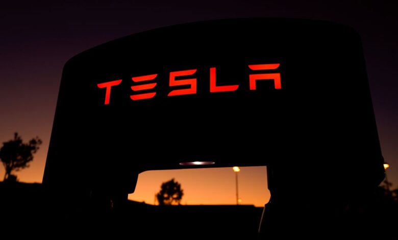 A Tesla supercharger is shown at a charging station in Santa Clarita, California