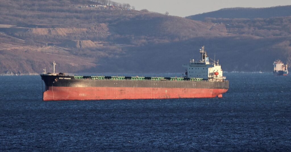 A bulk carrier lies at anchor in Nakhodka Bay