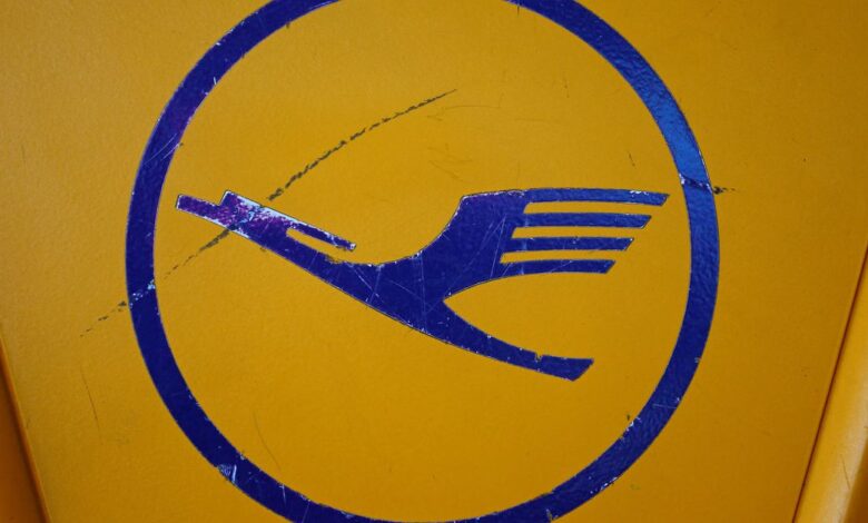 Lufthansa logo is seen on a self check-in machine at Frankfurt Airport in Germany