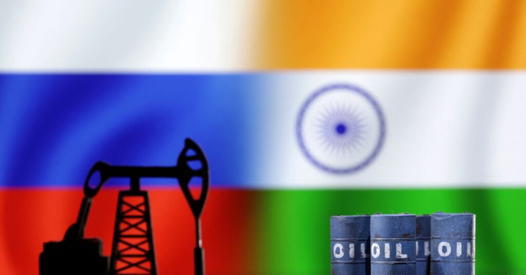 Illustration shows oil pump jack, Russian and Indian flags