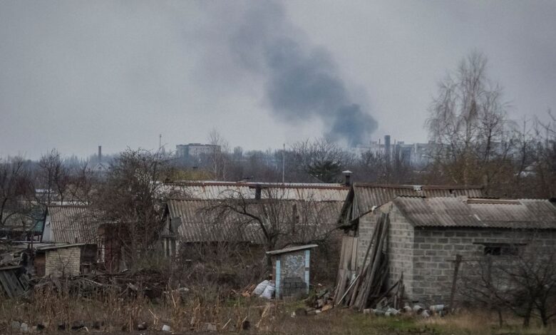 Smoke is seen during a shelling on the outskirts of the front line city of Bakhmut