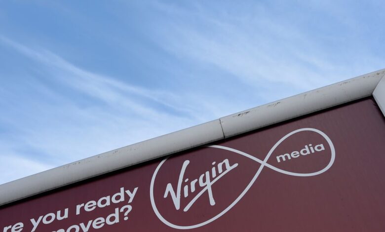 A billboard advertising Virgin media fibre broadband is seen in London, Britain