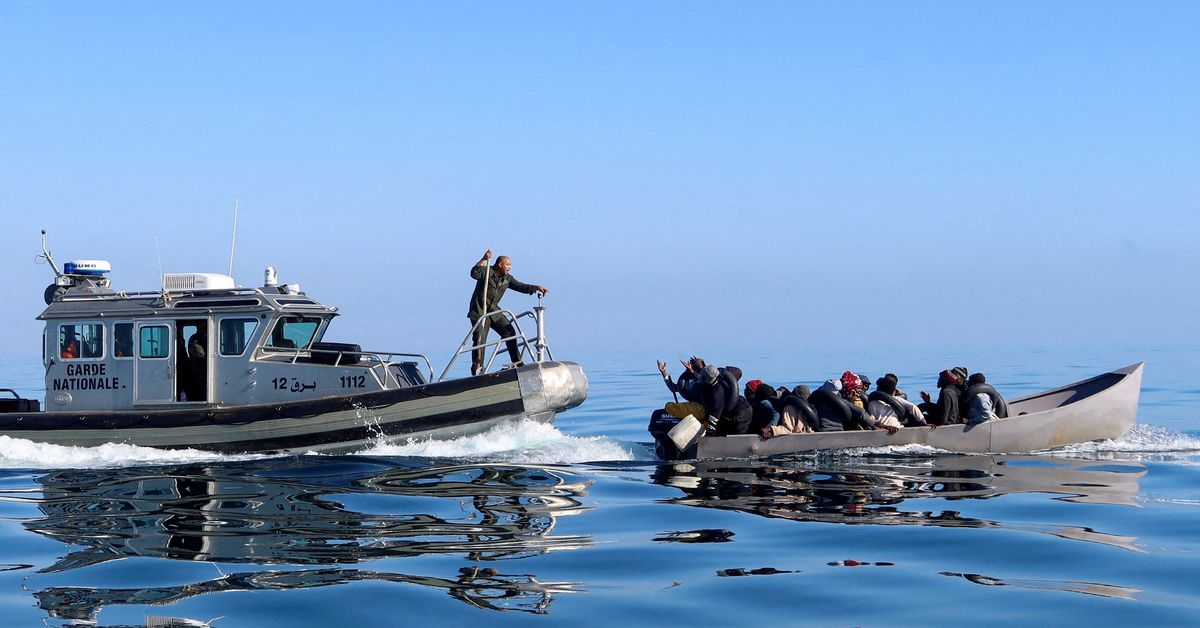 Tunisian coast guards try to stop migrants at sea, off Sfax