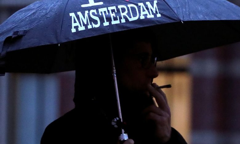 Man smokes a joint in central Amsterdam