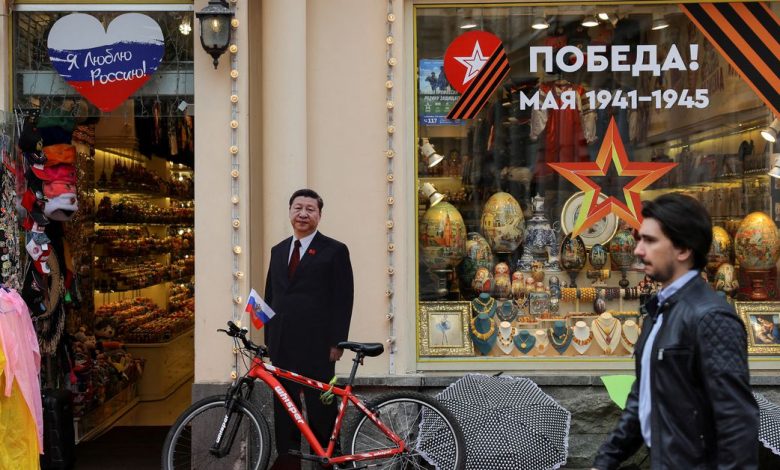 A cutout depicting Chinese President Xi Jinping is on display outside a gift shop in Moscow