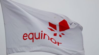 Equinor's flag flutters next to the company's headqurters in Stavanger