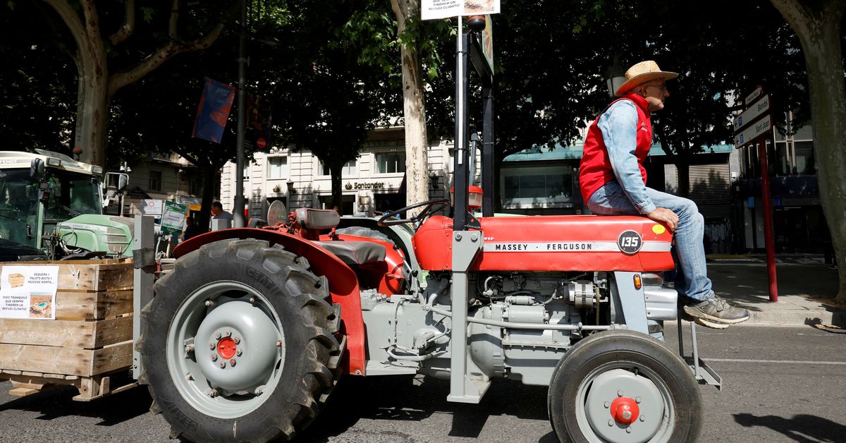 Spanish farmers in Catalonia stage a tractor go-slow protest against the effect of drought in Lleida