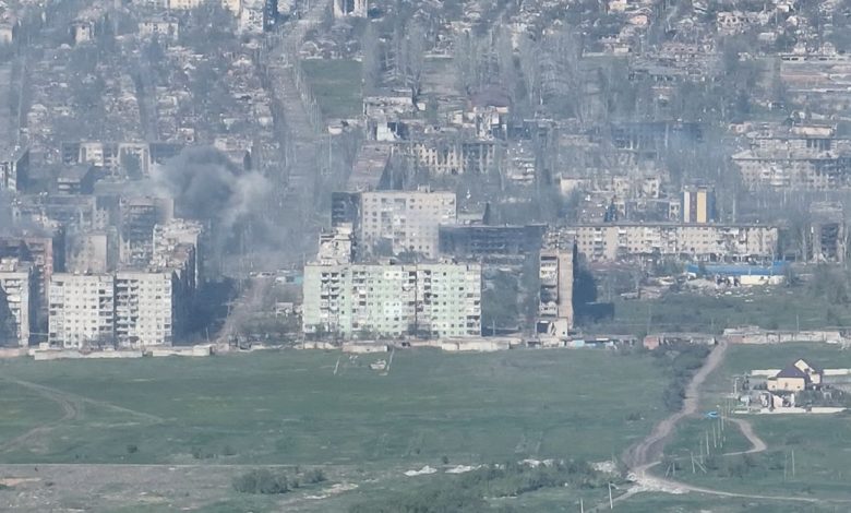 Smoke erupts following a shell explosion in Bakhmut
