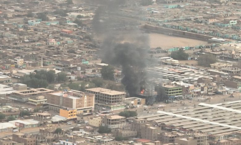 Plumes of smoke and fire at an Omdurman National Bank branch, in Omdurman