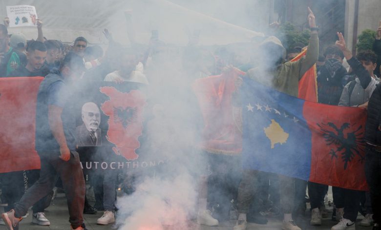 Albanians protest near the bridge which connects south and north Mitrovica
