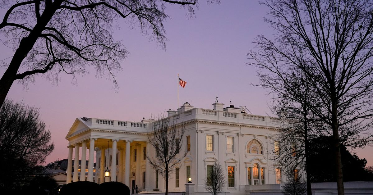 The White House is seen at sunset on U.S. President Joe Biden's first day in office in Washington